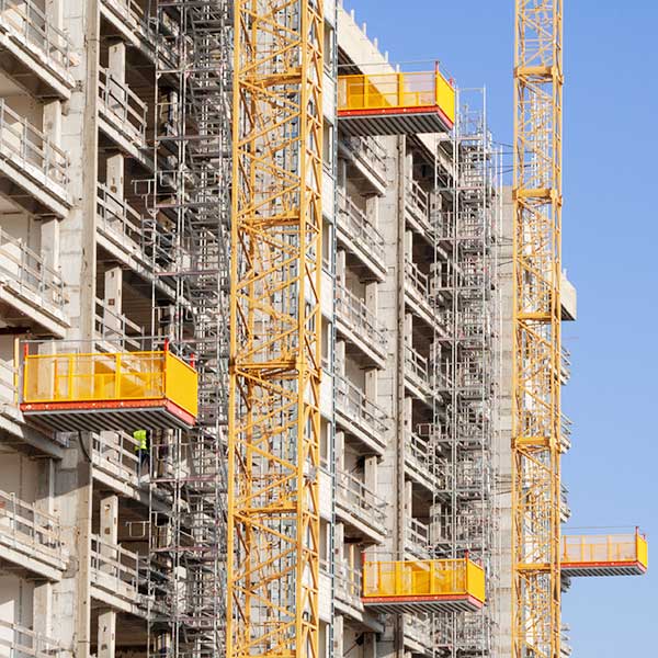 Construction site with shell and scaffolding