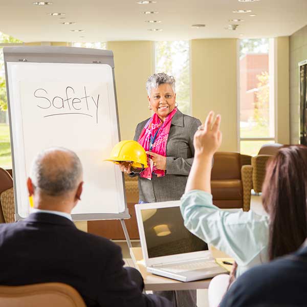Safety presentation with workers.